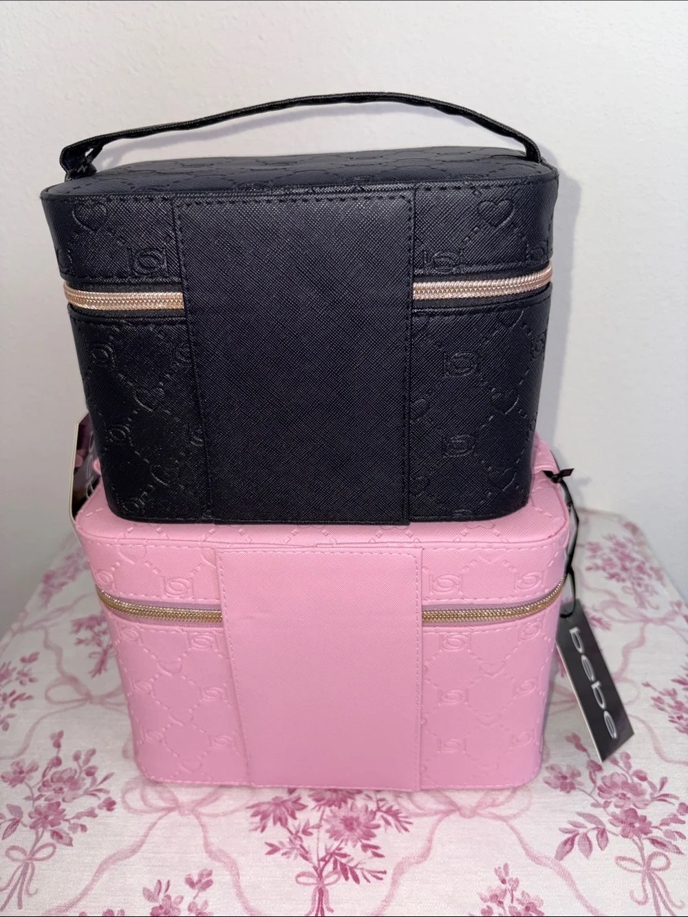 bebe Pink and Black Embossed Cosmetic Train Case Set with Gold Hardware